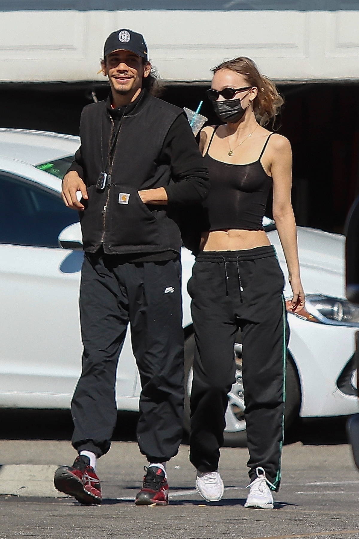 Lily-Rose Depp packs on the PDA with boyfriend Yassine Stein while out to lunch at Astro Burger in Los Angeles