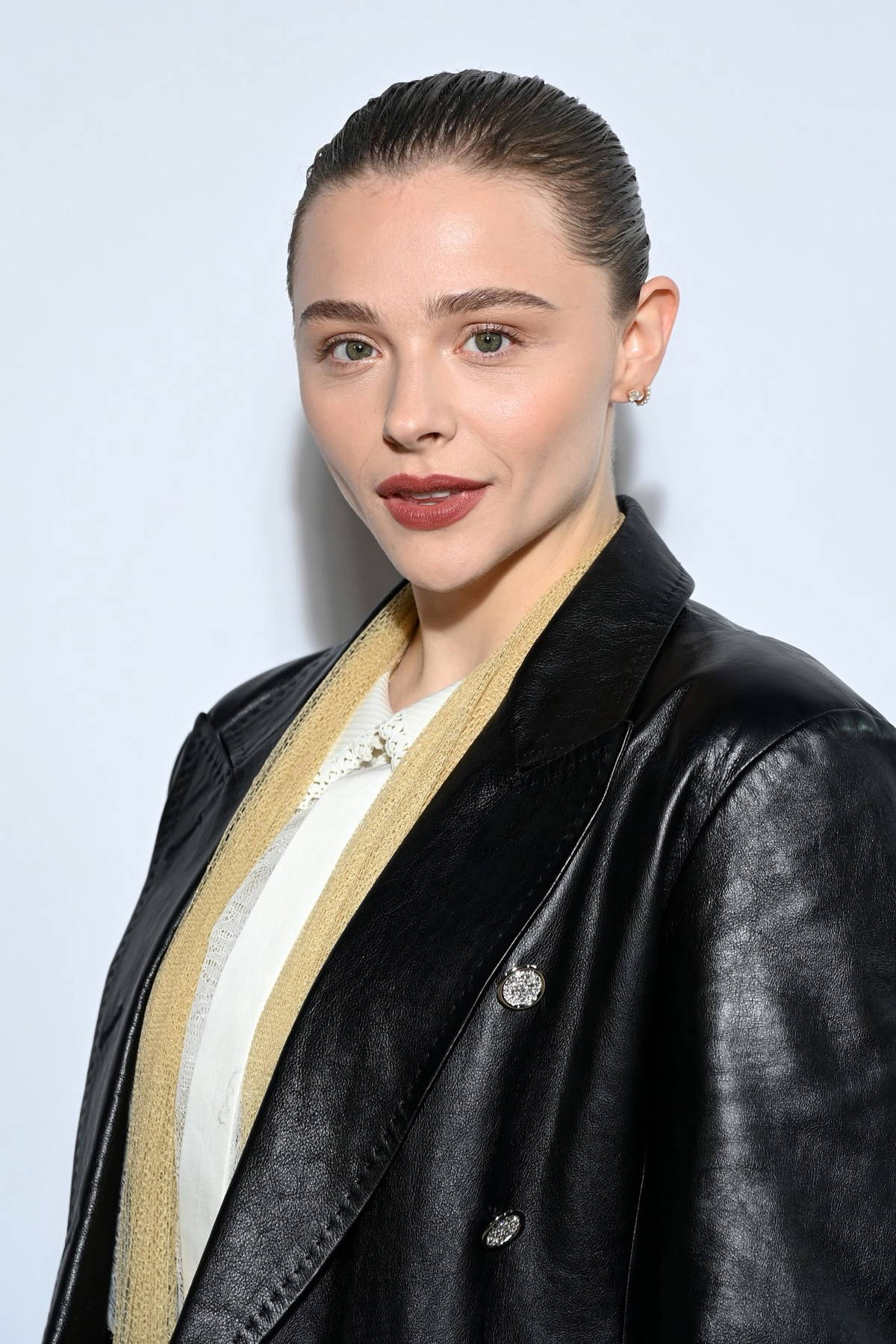 Chloe Grace Moretz is stunning in silver at Louis Vuitton PFW show
