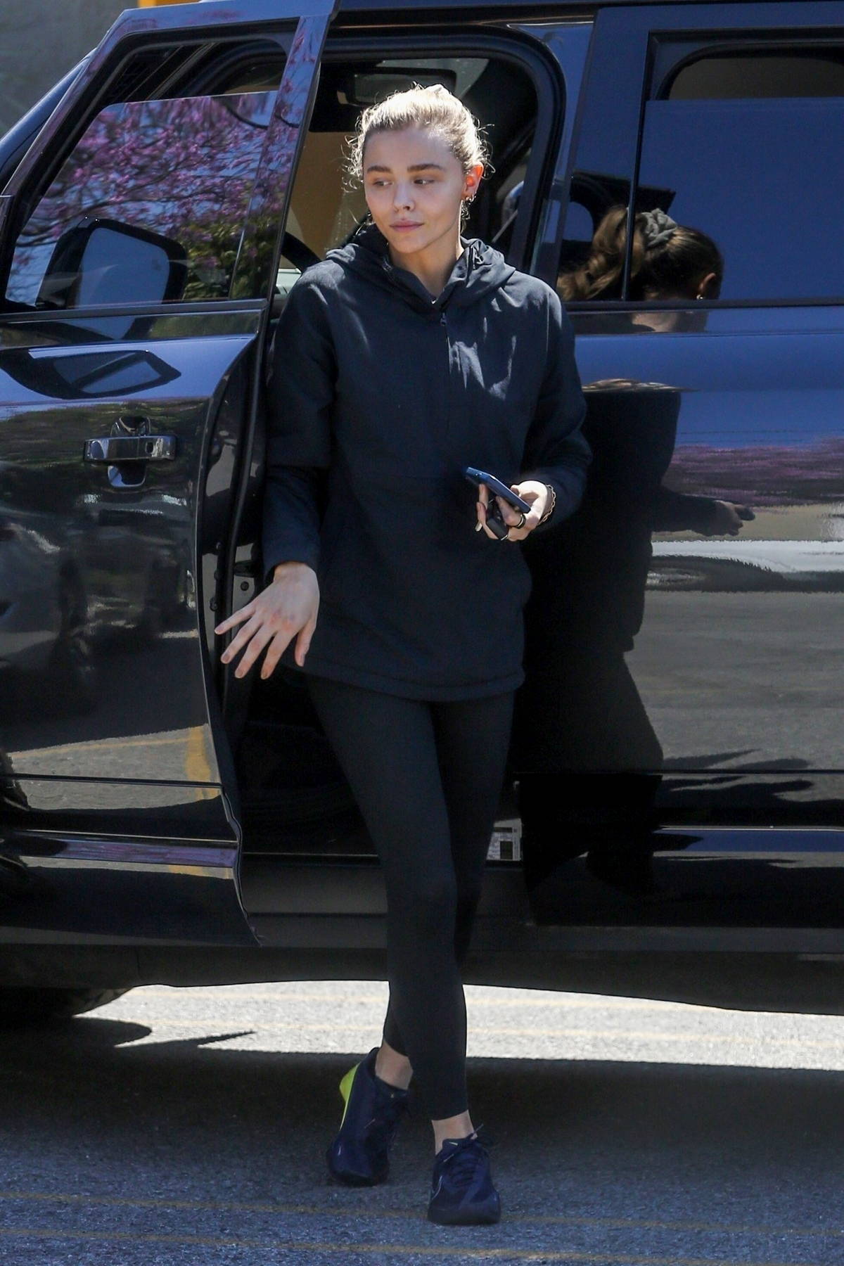 Chloe Grace Moretz cuts a laid-back figure in black leggings and a $330  hoody in West Hollywood