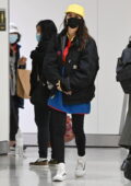 Emily Ratajkowski keeps a low profile as she touches down at the JFK airport in New York City