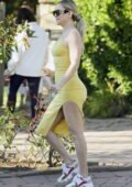 Kate Hudson shows off stunning curves in a form-fitting yellow dress while stepping out in Los Angeles