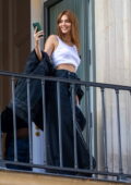 Kendall Jenner is all smiles while posing for a photoshoot at Costes Hotel during Paris Fashion Week in Paris, France