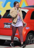 Kristen Bell dons a beige teddy jacket and burgundy leggings while running errands in Los Feliz, California