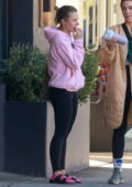 Kristen Bell leaves the gym sporting a pink hoodie and black leggings in Los Feliz, California