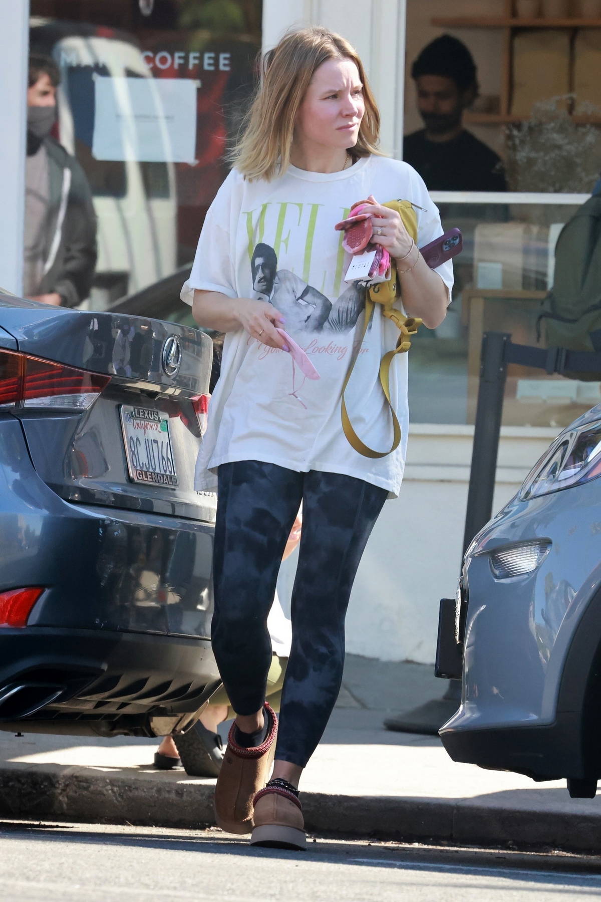 Kristen Bell wears an oversized t-shirt and leggings as she leaves