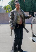 Rihanna bares her baby bump in a snakeskin vest while stepping out for lunch at Matsuhisa in Beverly Hills, California