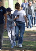 Jennifer Lopez and her son Max watch her daughter Emma play baseball for her school team in Los Angeles