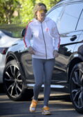 Kate Hudson sports an Aviator Nation hoodie and grey leggings