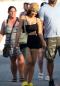 Cardi B flaunts her curves in black crop top and short shorts while during a family vacation in Cabo San Lucas, Mexico