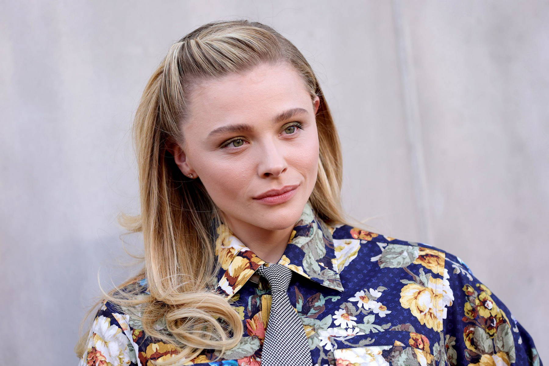 Chloe Grace Moretz stands out in a floral-print top at Louis Vuitton's 2023  Cruise Show in San Diego