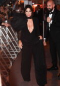 Eva Longoria looks great in a plunging black jumpsuit while out during the 75th Cannes Film Festival in Cannes, France