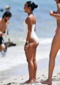 Karrueche Tran shows off her beach body in a white swimsuit while enjoying  a fun day
