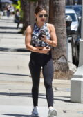 Lucy Hale sports a patterned top and black leggings as she leaves a Pilates  class and