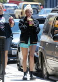 Ashley Benson cuts a casual figure while making a juice run with a friend in Los Feliz, California