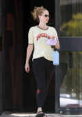 Jennifer Lawrence attends a Pilates class sporting a yellow t-shirt and black leggings in Century City