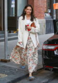 Katie Holmes wears a floral print dress with an off-white blazer while stepping out in New York City