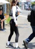 kendall jenner wears a white top, black leggings and nike sneakers while  stepping out for lunch in los angeles-160622_7