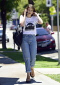 Lauren Cohan wears a t-shirt and jeans while spotted leaving a hair salon in West Hollywood, California