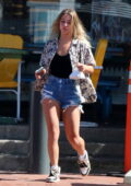 Madelyn Cline flaunts her legs in tiny denim shorts while she grabs lunch with a mystery man at Malibu Kitchen in Malibu, California