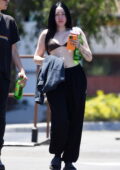 Noah Cyrus beats the heat in a bikini top while stepping out with her boyfriend in Los Angeles