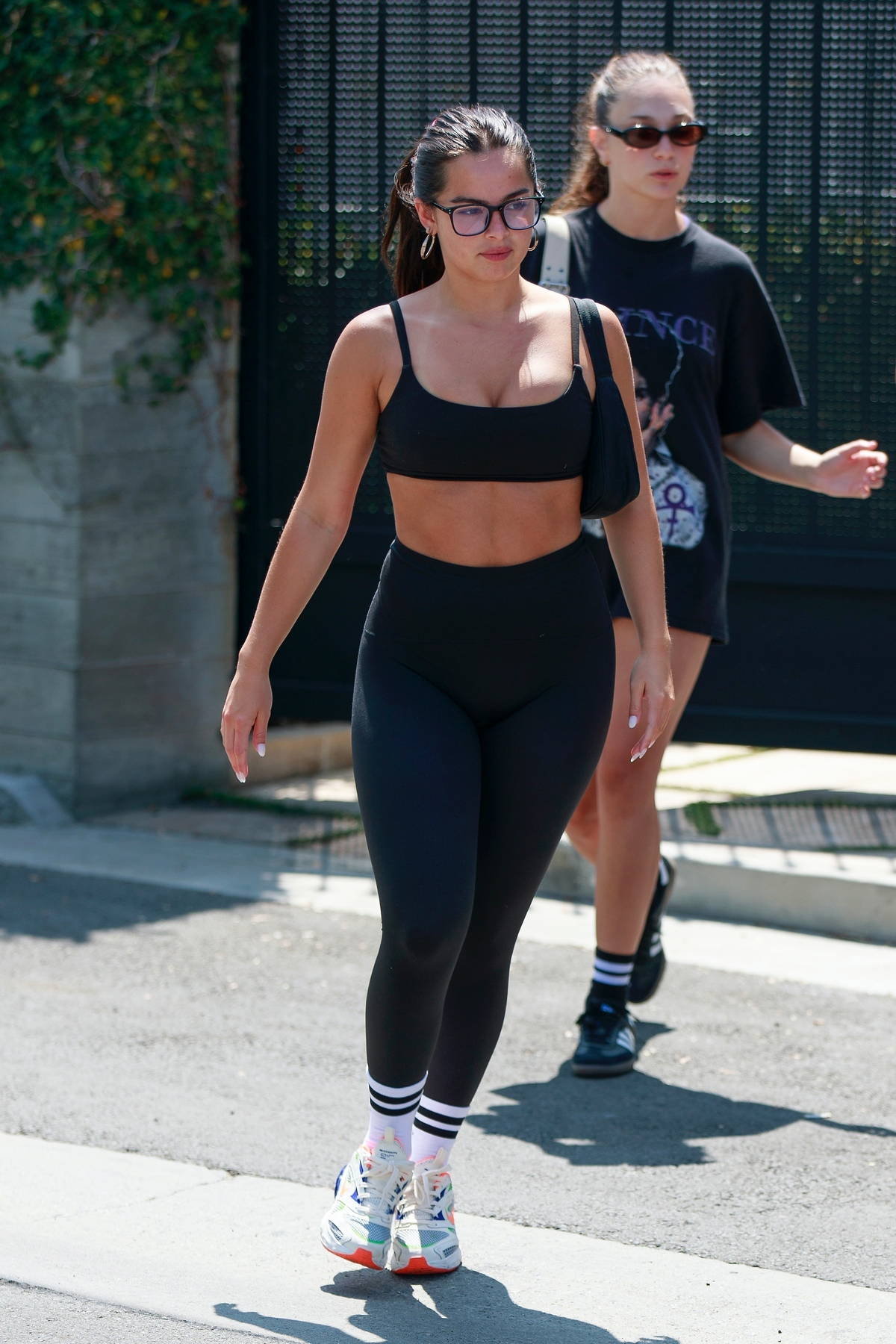 Addison Rae seen leaving her Pilates class wearing an oversized tee and  black leggings in West