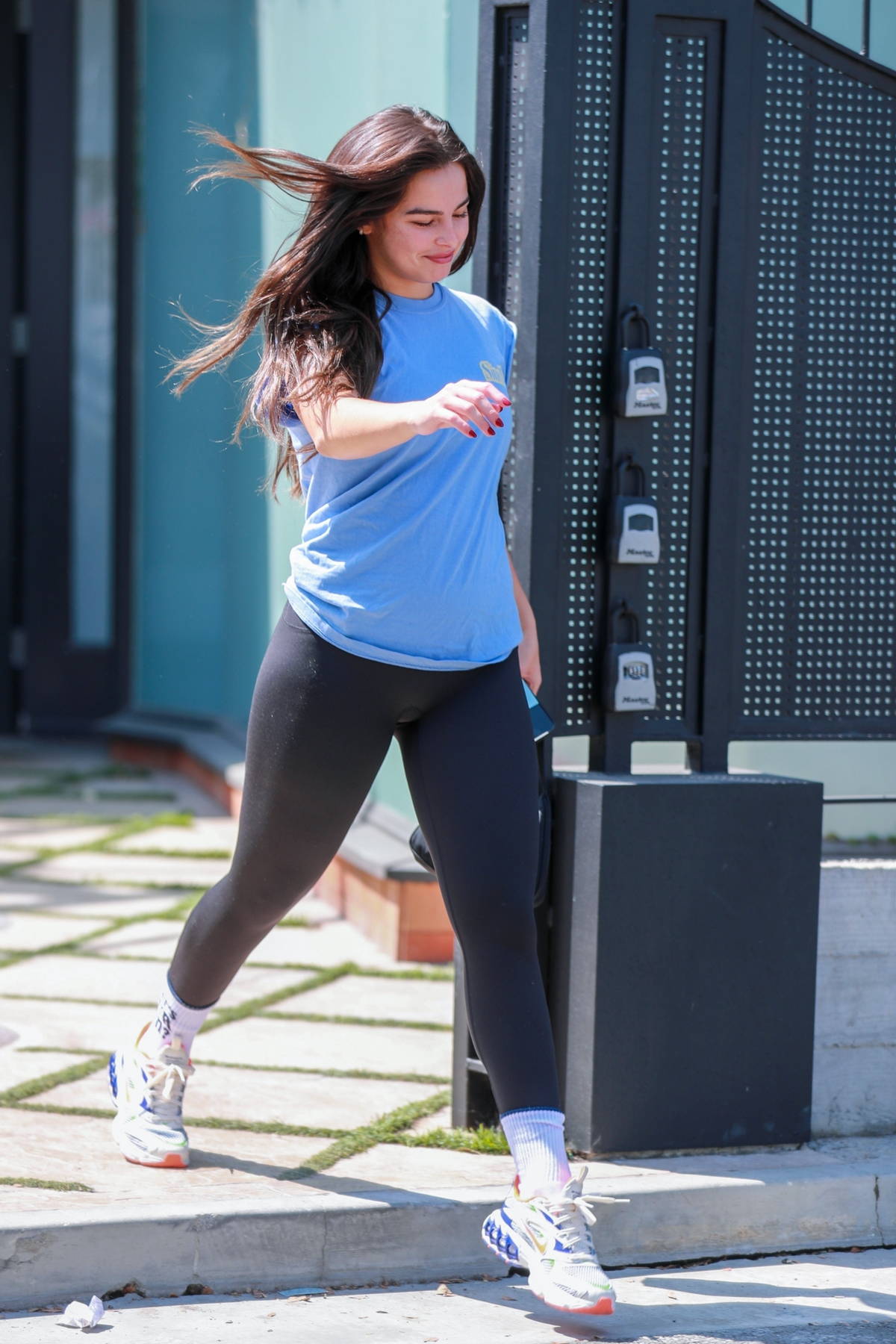 Addison Rae dons a black crop top and leggings for her morning Pilates  session in West