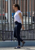 Jennifer Garner wears a white tee and navy leggings while she picks up her son from his swim class in Pacific Palisades, California