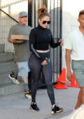 Jennifer Lopez displays her curvy figure in snakeskin leggings as she leaves a dance studio in Los Angeles