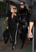 Kim Kardashian and Khloe Kardashian look stylish in all-black ensemble during a dinner outing at Giorgio Baldi in Santa Monica, California