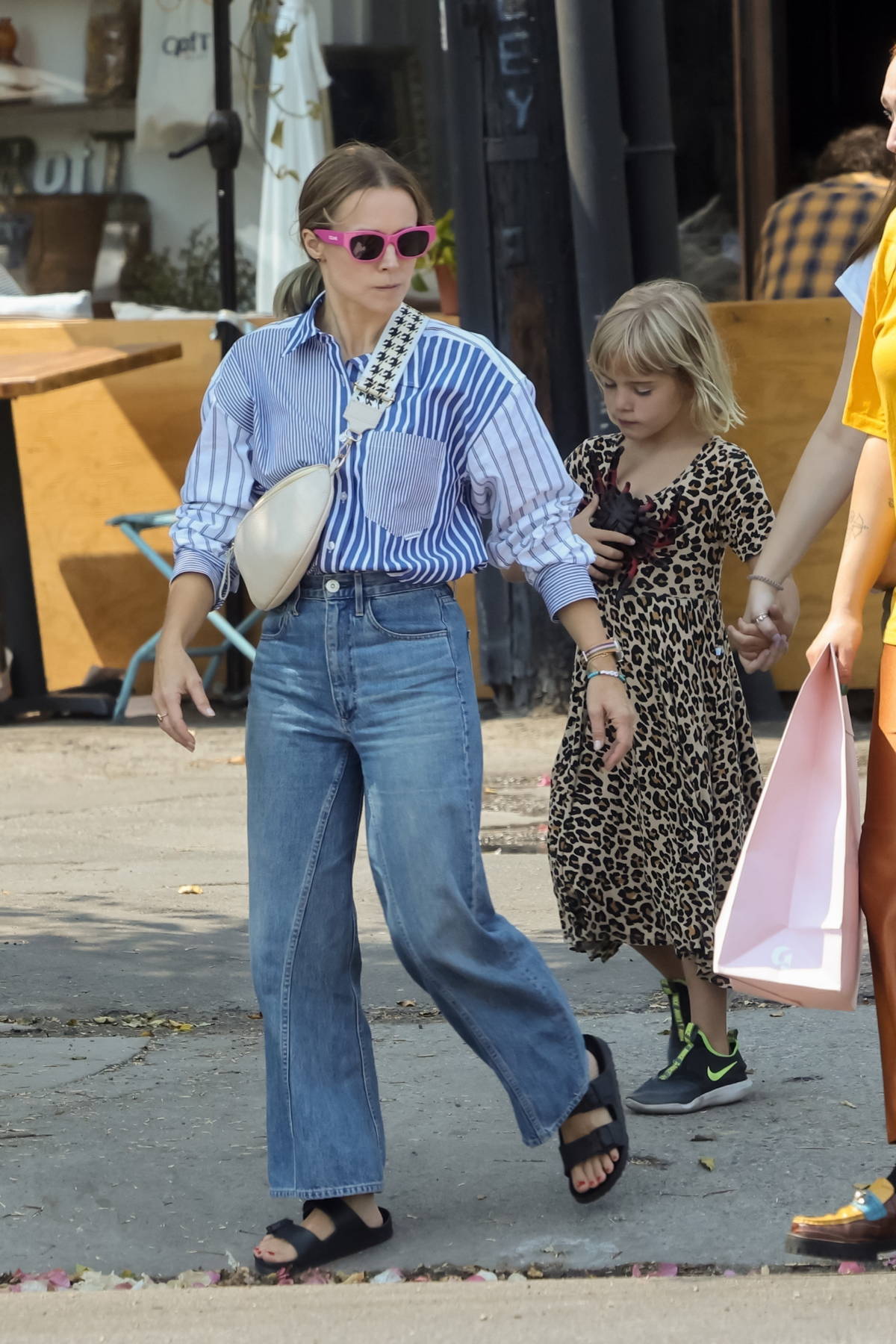 Kristen Bell wears striped blue shirt and jeans for a shopping trip with  her daughter in