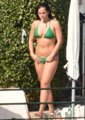 Addison Rae looks sensational in a green bikini during a PDA-filled pool day with boyfriend Omer Fedi in Portofino, Italy