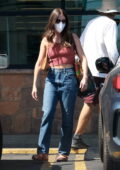 Alison Brie wears a tank top top and jeans for grocery shopping at Gelson's Market in Los Feliz, California