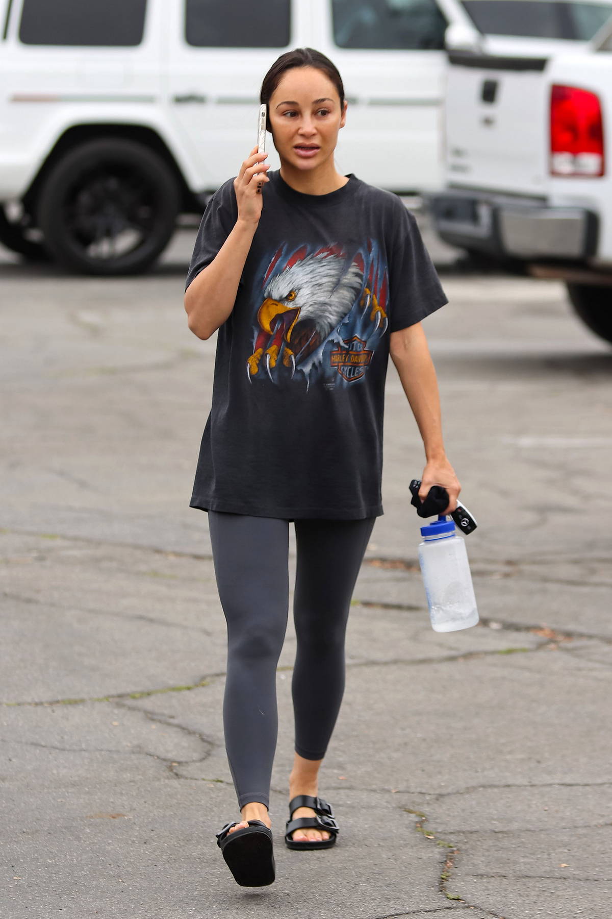 Olivia Munn wears an oversized sweatshirt with leggings as she leaves a gym  in West Hollywood