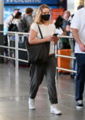 Jennifer Lawrence and husband Cooke Maroney arrive at JFK Airport in New York City