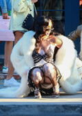 Winnie Harlow poses in lingerie and white fur coat during a photoshoot in West Hollywood, California