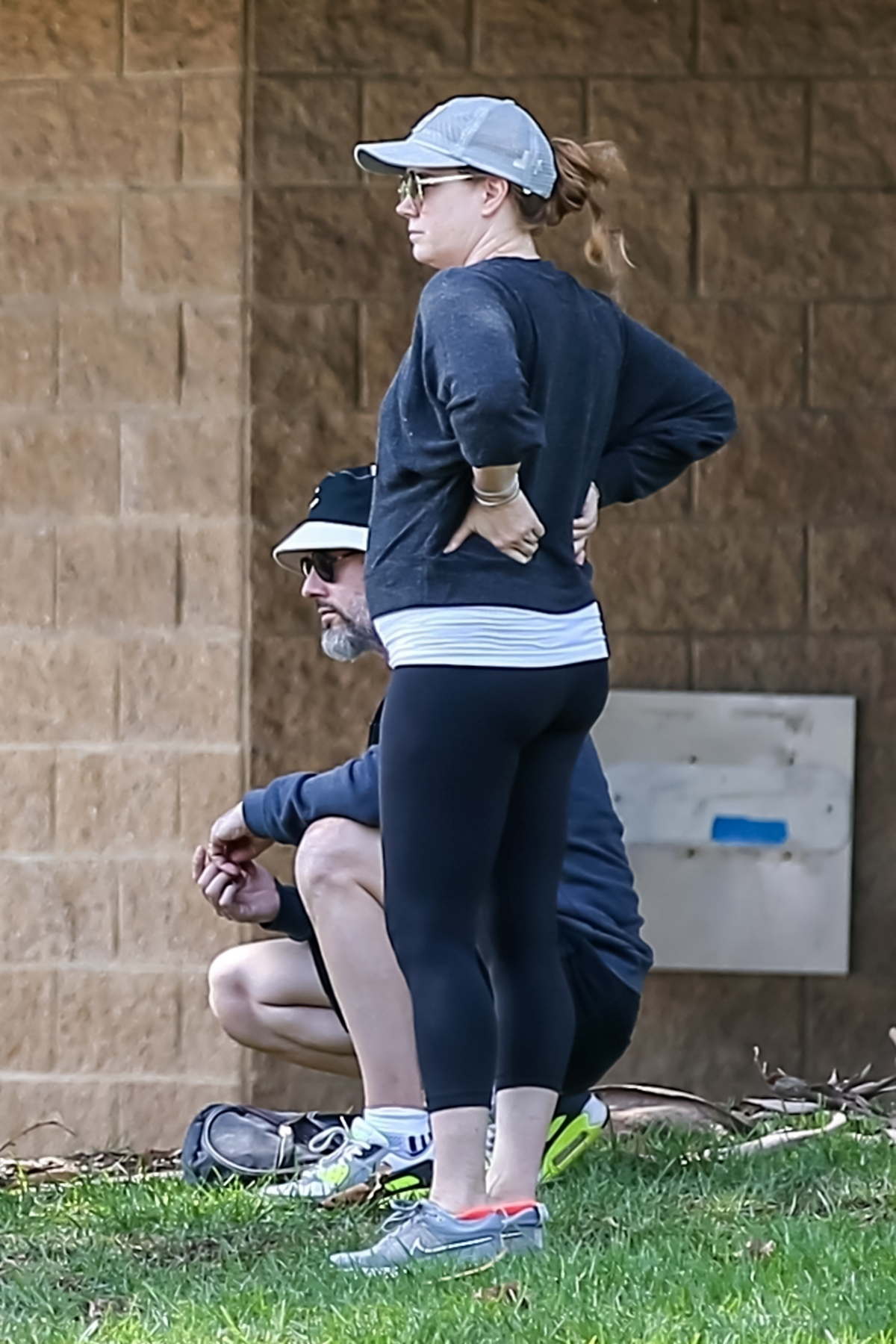 Amy Adams keeps it casual in a black top and leggings while at her