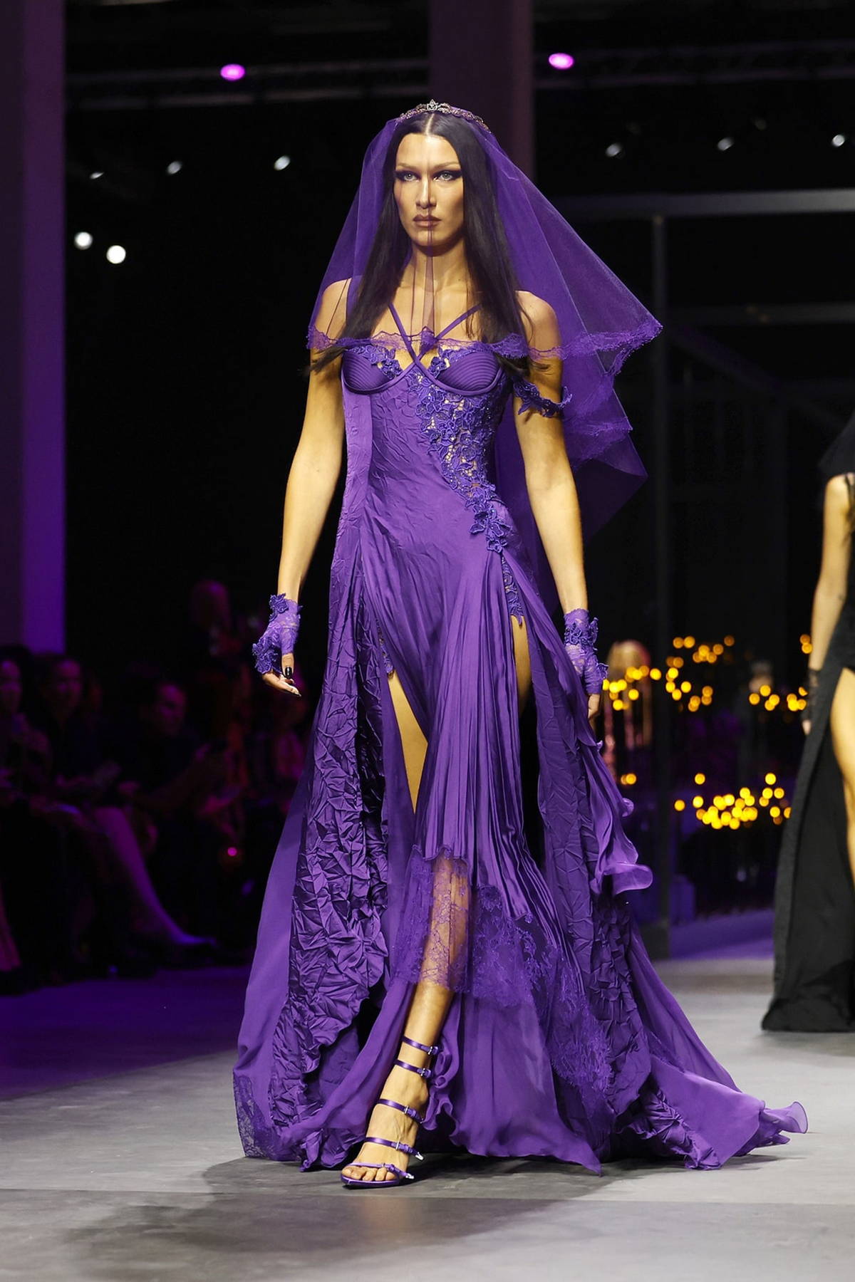 Bella Hadid vamps it up in an edgy purple gown with a matching VEIL - W1