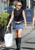 Brec Bassinger wears a black tank top and short denim skirt while out shopping in Vancouver, Canada