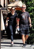 Gal Gadot wears a black t-shirt and leggings while out for lunch with  husband Jaron Varsano at Il Pastaio in Beverly Hills, California