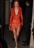 Gigi Hadid looks stylish in a red hooded dress while attending Versace after-party in Milan, Italy