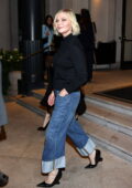 Paris Jackson looks stylish in a tan shirt with a beige camisole and blue  skinny jeans