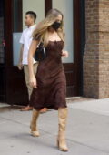 Margot Robbie looks amazing in a burgundy dress while heading out to dinner with husband Tom Ackerly in New York City