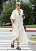 Molly Sims wears a flowing maxi dress during a coffee run in Santa Monica, California
