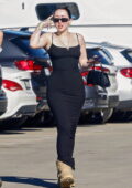 Noah Cyrus wears a body-hugging black dress while out shopping for groceries in Studio City, California