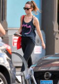Olivia Wilde shows off her toned body in a tank top and leggings as she leaves after a workout session in New York City