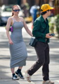 Sophie Turner Turns a T-Shirt Into a Dress in Sheer Tights & Sneakers –  Footwear News