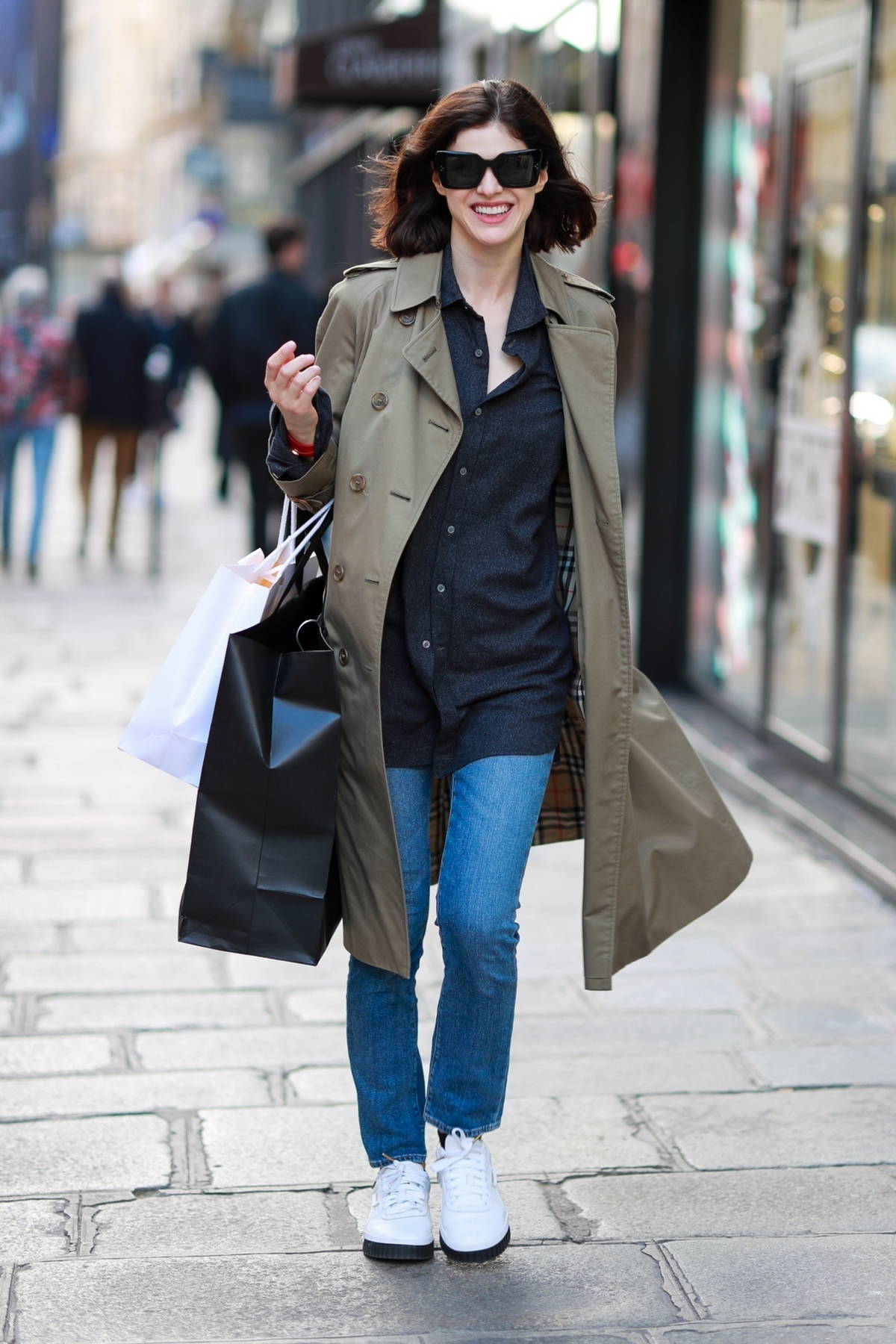 Alexandra Daddario is all smiles while enjoying a solo shopping spree ...