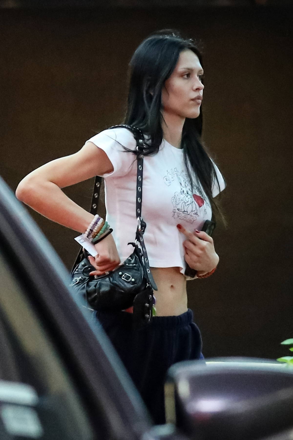 Kendall Jenner flaunts her washboard abs in crop top in West Hollywood