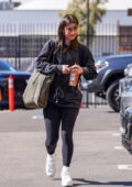 Charli D'Amelio dons a black sweater and leggings while spotted outside the DWTS studios in Los Angeles