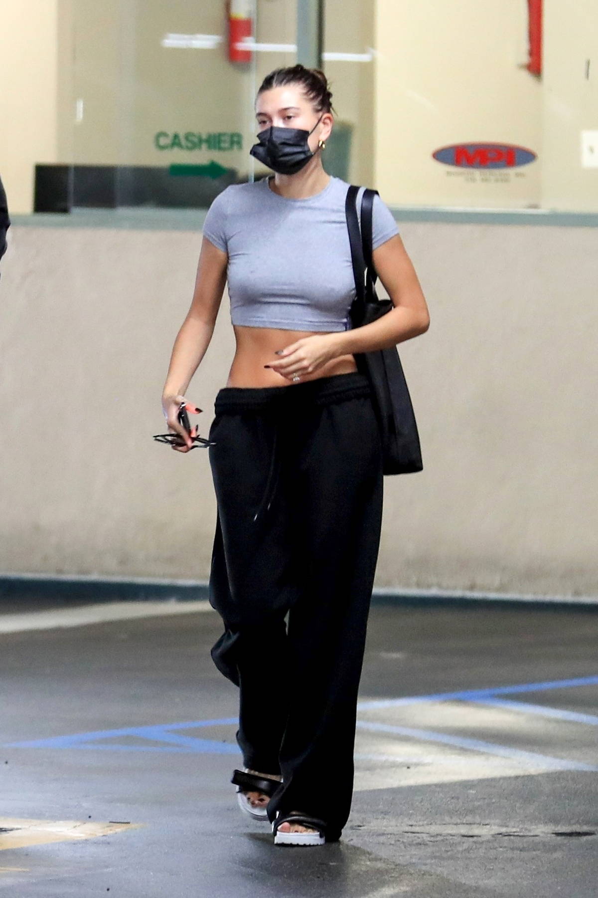 Hailey Bieber Shows Off Abs in One-Shoulder Sports Bra